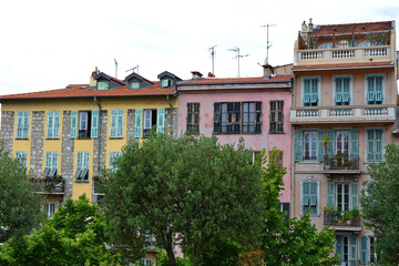Fototapeta na wymiar Pastel buildings of Nice, France on the French Riviera