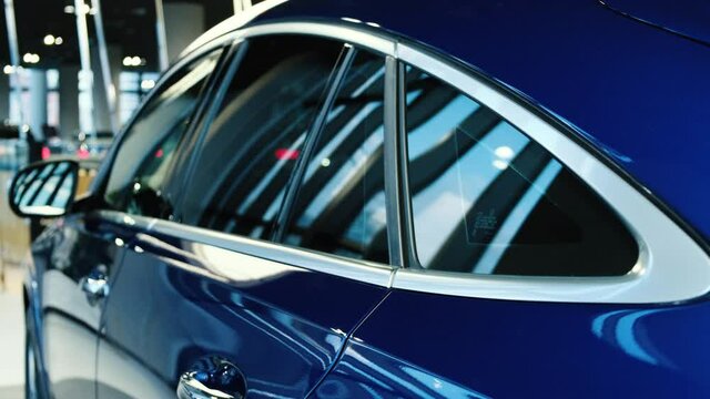 Side door windows of a new SUV from a premium car brand. Sale of new cars in the dealer showroom