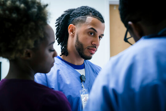 Serious nurses talking