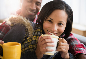 Portrait of happy couple drinking coffee