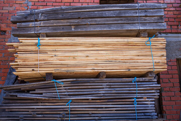 Piles stack of timber on construction site