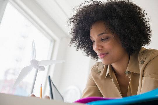Low angle view of businesswoman working at desk