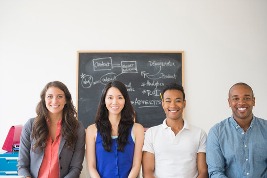 Business people smiling in office