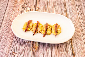 breaded sardines with anchovies