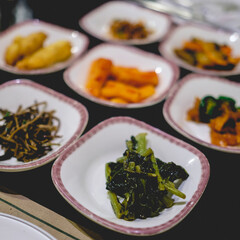 Traditional koran 'banchan' (small side dishes served along with cooked rice in Korean cuisine) dishes in a table