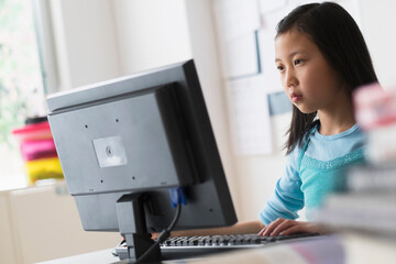 Chinese student using desktop computer