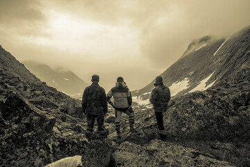 Hikers admiring mountain valley