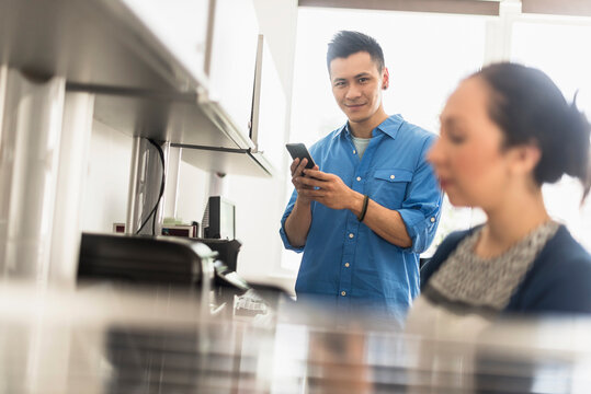 Business people using technology in office