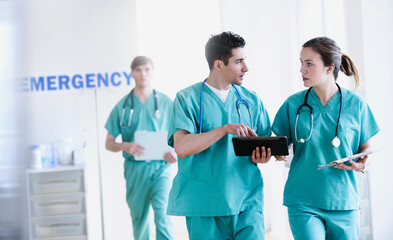 Doctors talking in hospital emergency room