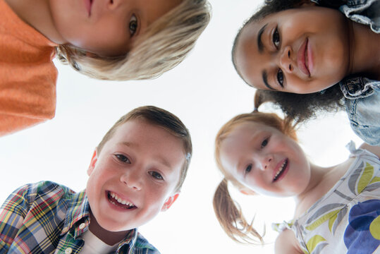 Low angle view of smiling children