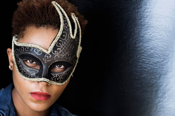 Mixed race woman wearing mask