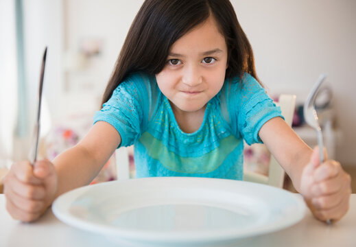 Hungry girl impatient for food