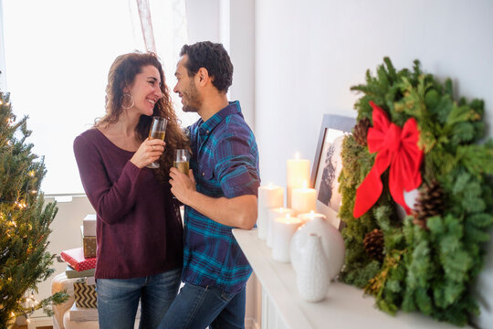 Couple drinking champagne at Christmas