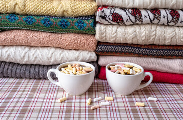 cup coffee knitted sweater pullover a lot of many hat two red