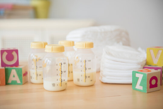 Blocks, diapers and bottles of breast milk
