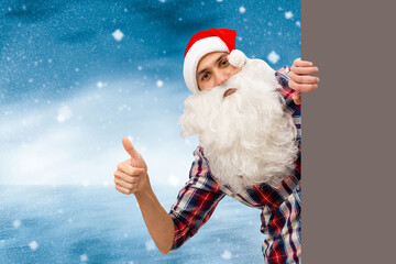 Santa Claus holding a pizza box and making a thumb up sign isolated on white background