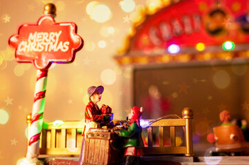 miniature christmas amusement park scene with lights - traditional decoration figure