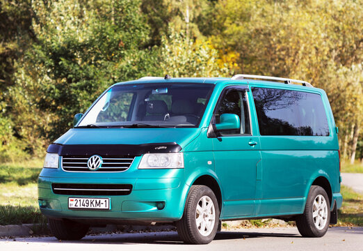 Belarus, Brest - August 04, 2019: T 5 Transporter green passenger van front view. Photographing a modern car in the parking lot in Brest.n