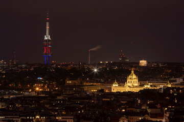 Fototapeta premium .view of the roofs of buildings and street lights in prague at night in the czech republic