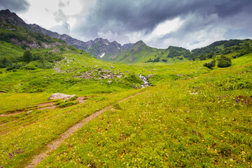 Fototapeta premium Beautiful mountain landscape at Caucasus mountains with clouds