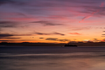 Fototapeta na wymiar Sunset at the Mouro lighthouse, Santander, Cantabria.