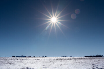 Sun on Snow Field