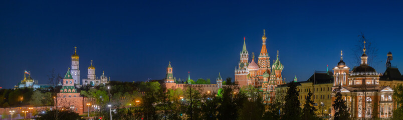 The panorama of center of Moscow city in bright night lights. Moscow Kremlin and Saint Basils Cathedral
