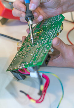 Repair and soldering of uninterruptible power supply.