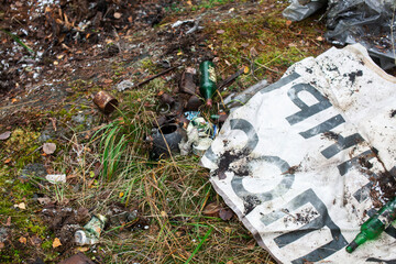 big amount of trash in forest, global environment issues