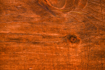 Textura en madera rojiza con vetas y nudos natural de piso o techo