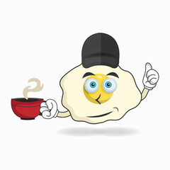Egg mascot character holding a hot cup of coffee. vector illustration