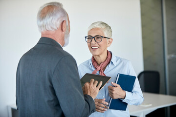 senior busniess people talking office communication meeting teamwork gray hair active colleague...