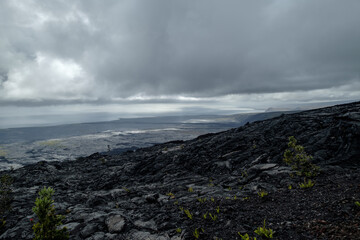 a rocky landscape with a cloudy sky