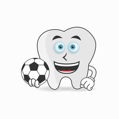 The Tooth mascot character becomes a soccer player. vector illustration