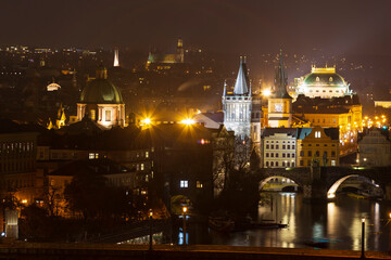 Obraz premium Night Prague City with its Cathedrals, Towers and Bridges in the Christmas Time, Czech Republic