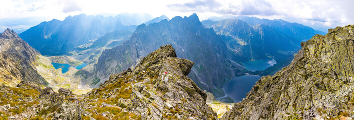 Panorama of High Tatras mountains. View from mt Rysy (2503m) on the border between Slovakia (left) and Poland (right). Zabie lakes (Slovakia) and Morskie Oko lake (Poland) on background © katatonia