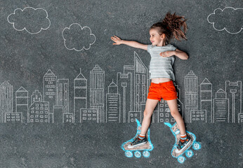 Girl in roller skates painted with chalk