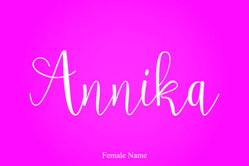 Female Name "Annika" Handwritten Cursive Calligraphy On Pink Background