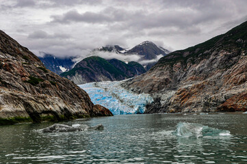 A glacier flows to the sea.