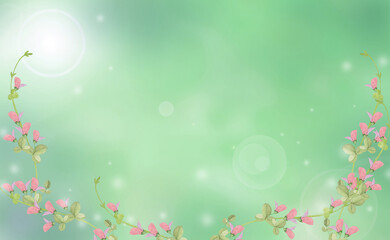 ピンクの花の蔓　緑色背景