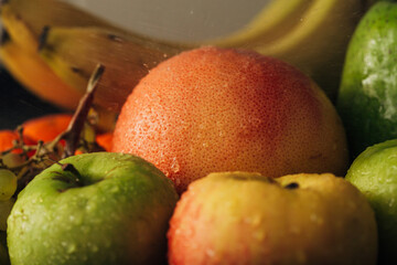 Composition with Summer Colorful Fresh Fruits on Wooden Brown Background