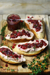 Sandwiches with turkey or duck pate and cranberry sauce. Festive snack.