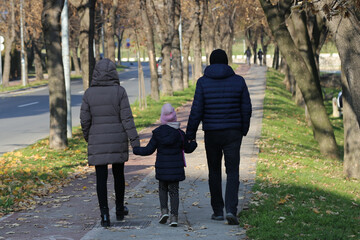 Family walking in the park