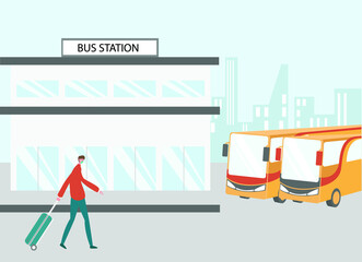 Male passenger wearing face mask and walking in bus station while carrying suitcase © Creativa Images