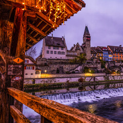 Fototapeta na wymiar view from the wooden bridge of a medieval town 