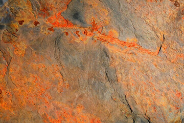 The texture of stone wall corrosion or grunge stone texture use for web design and wallpaper...