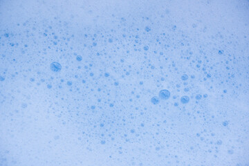Abstract background white soapy foam texture. Shampoo foam with bubbles