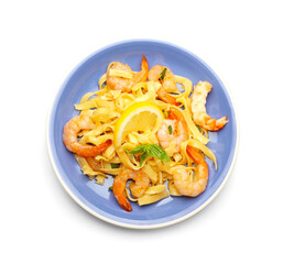 Plate of tasty pasta with shrimps on white background