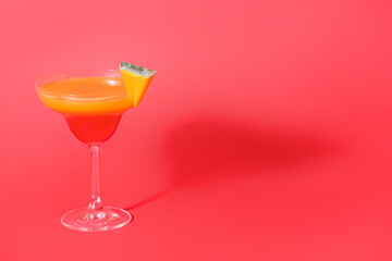 Glass of tasty pumpkin pie martini on color background