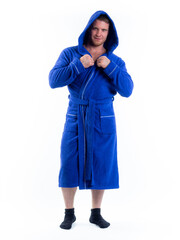 strong man in a Bathrobe on an isolated white background with a smile on his face.